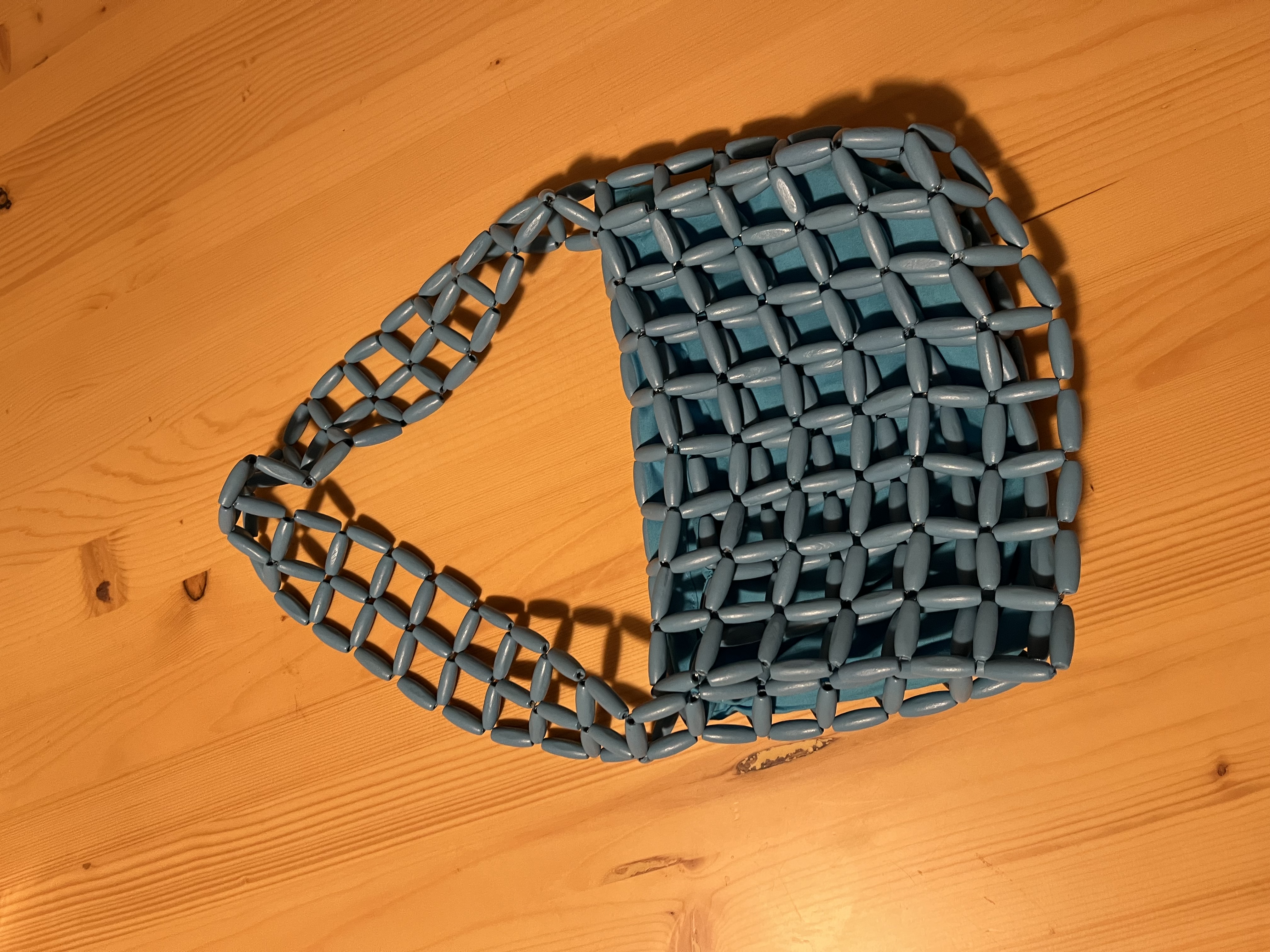 Before AI product photography - original leather bag photo taken with phone